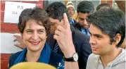  ??  ?? Congress general secretary Priyanka Gandhi along with her son Raihan Vadra at a polling station in Lodhi Estate area of New Delhi on Saturday