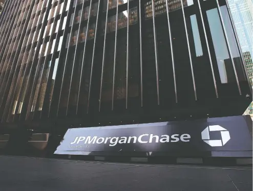  ?? CHRIS HONDROS/GETTY IMAGES ?? Three people on JP Morgan’s precious-metals desk are accused of placing fraudulent orders in an effort to move prices in their favour.