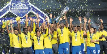  ?? ?? Mamelodi Sundowns celebrate winning the Dstv Premiershi­p after beating Maritzburg United at Loftus Versfeld in Pretoria on 16 May 2023. Photo: Lefty Shivambu/gallo Images