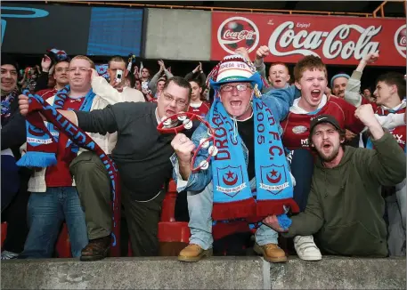  ??  ?? Drogheda United fans celebrate at the final whistle.