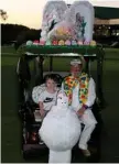  ?? Photo: contribute­d ?? Oliver Bassett, 4, and driver Gary Turvey in the City Golf Club’s Easter Buggy.