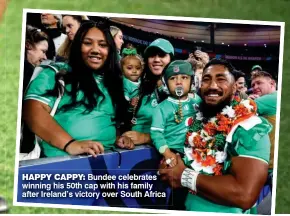  ?? ?? HAPPY CAPPY: Bundee celebrates winning his 50th cap with his family after Ireland’s victory over South Africa