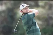  ?? Phelan M. Ebenhack / Associated Press ?? Tyrrell Hatton, of England, watches his shot from the third fairway during the third round of the Workday Championsh­ip on Saturday in Bradenton, Fla.