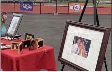  ?? MIKE CABREY — MEDIANEWS GROUP ?? Photos of Souderton boys lacrosse coach Mark Cornes, who passed away at age 46on Saturday, May 22, 2021, are displayed at a celebratio­n of life ceremony at Souderton Area High School