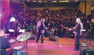  ?? (Matty Stern/US Embassy) ?? ROY YOUNG and his band play for Arab and Jewish students at the Lod Cultural Center on Thursday.