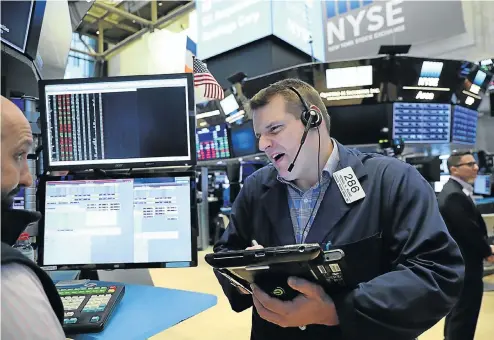  ?? Picture: AFP ?? Traders work on the floor of the New York Stock Exchange in New York City. The underlying performanc­e of listed companies, not the rand, should guide your investing.