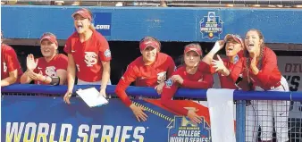  ?? SUE OGROCKI/ASSOCIATED PRESS ?? Florida State players cheer in the dugout during the second inning of the Seminoles win over Washington in Game 1 of the College World Series Monday.