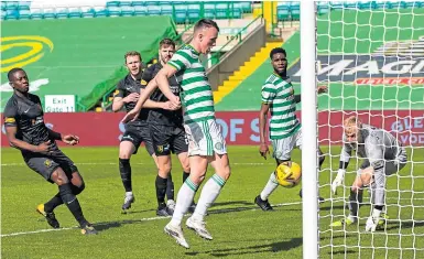  ??  ?? David Turnbull’s unorthodox finish makes it 2-0