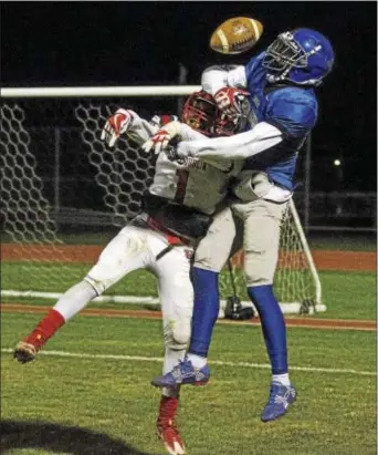  ?? RICK KAUFFMAN — DIGITAL FIRST MEDIA ?? Academy Park’s last hope was a Skylor Fillis fourth down pass attempt to Knights receiver Tahriq Marrero, right, that was broken up by Upper Dublin cornerback Selvin Haynes.