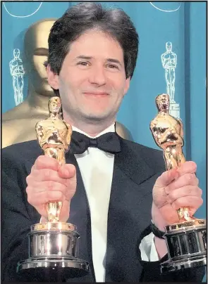  ?? Picture: AP ?? TITANIC FEAT: Horner with the Oscars earned for his film score