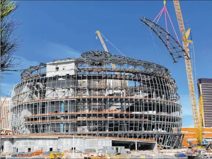  ?? Michael Quine Las Vegas Review-journal @Vegas88s ?? Crews on Monday place one of 32 roof trusses, weighing more than 100 tons apiece, on the MGM Sphere project.