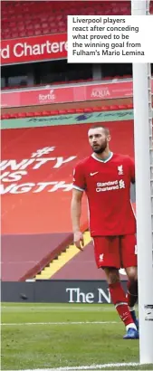  ??  ?? Liverpool players react after conceding what proved to be the winning goal from Fulham’s Mario Lemina