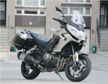  ?? DAVID BOOTH, DRIVING ?? The 2016 Kawasaki Versys 1000 LT boasts a smooth in-line four with prodigious torque.