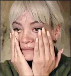  ??  ?? Emotional: Lily Allen apologisin­g