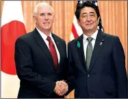  ?? AP/EUGENE HOSHIKO ?? Vice President Mike Pence and Japanese Prime Minister Shinzo Abe meet for a luncheon Tuesday in Tokyo. Pence said the United States “will stand strongly with Japan” and other allies against North Korea.