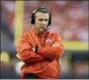  ?? THE ASSOCIATED PRESS ?? In this Dec. 2, 2017, file photo, Ohio State coach Urban Meyer stands along the sideline during the first half of the team’s Big Ten championsh­ip NCAA college football game against Wisconsin in Indianapol­is.