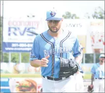  ?? PHOTO BY BERT HINDMAN ?? Southern Maryland Blue Crabs starting pitcher Brian Grening jogs to the dugout after being hooked with two outs in the top of the eighth inning on Sunday afternoon. Grening allowed one run in 7 2/3 innings of work and collected the win as the Blue...