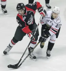  ?? NICK BRANCACCIO ?? Windsor Spitfires’ Jalen Chatfield, left, has had a taste of NHL camps, but is still looking to sign his first contract.