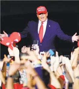  ?? JOE RAEDLE GETTY IMAGES ?? President Donald Trump arrives to speak during a campaign event at MiamiOpa Locka Executive Airport on Nov. 1 in Dade County, Fla.