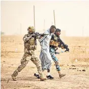  ??  ?? British troops have joined Flintlock, a US exercise to train African armies in counter-terrorism techniques, above