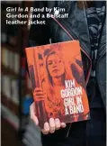  ??  ?? Girl In A Band by Kim Gordon and a Belstaff leather jacket