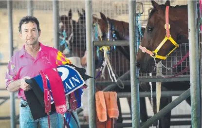  ?? Picture: SCOTT RADFORD- CHISHOLM ?? DETERMINED: Townsville racehorse trainer Alby Molino is firmly behind the strike action.