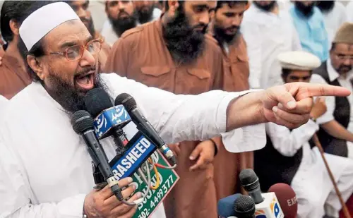  ?? LASHKAR- E- TOIBA FOUNDER HAFIZ MUHAMMAD SAEED DURING
ONE OFHIS FIERY SPEECHES
AFP ??