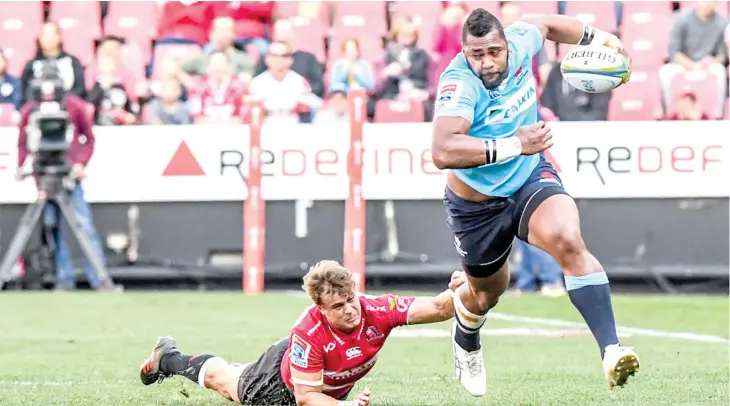  ?? Photo: Zimbio ?? Taqele Naiyaravor­o of the Waratahs with possession during the Super Rugby semi-final clash against Emirates Lions at Emirates Airline Park in Johannesbu­rg, South Africa, on July 28, 2018.
