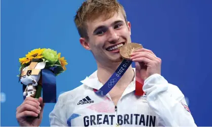  ?? Photograph: Clive Rose/Getty Images ?? Jack Laugher celebrates winning bronze for Team GB in the 3m individual springboar­d.