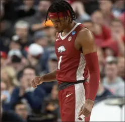  ?? ?? It was a rough outing Thursday for Arkansas and star guard Ricky Council IV, who shot just 4 of 12 from the field. Connecticu­t crushed the Razorbacks 88-65.