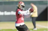  ?? JEFF CHIU/AP ?? 49ers wide receiver Deebo Samuel catches a pass during practice in Santa Clara, Calif. on Thursday. The 49ers are scheduled to play the Lions on Sunday in the NFC championsh­ip game.