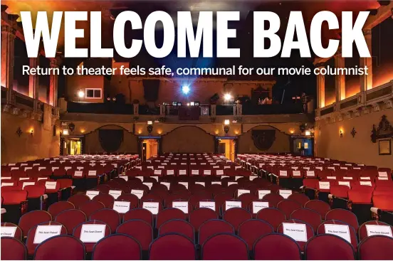  ?? TYLER LARIVIERE/SUN-TIMES ?? Taped signs mark the hundreds of seats that are closed in the 750-seat main auditorium of the Music Box Theatre in Lake View.