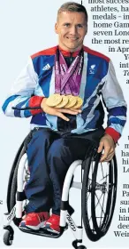  ??  ?? Show us your medals: David Weir with his golden haul in 2012