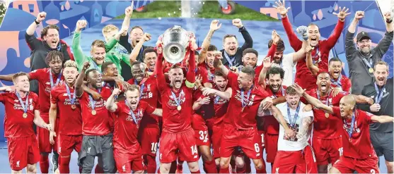  ??  ?? A file photo of Liverpool players celebratin­g their 2018-19 Champions League title win at Wanda Metropolit­ana in Madrid, Spain