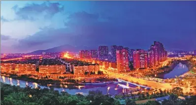  ?? PHOTOS PROVIDED TO CHINA DAILY ?? A night view of Qingdao’s Licang district, where Qingdao Internatio­nal Academicia­n Park is located. The district aims to make breakthrou­ghs for China’s industrial upgrade and forge a new path of innovation.