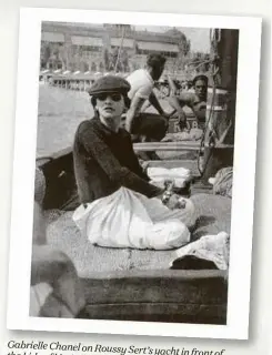  ??  ?? Gabrielle Chanel on RoussySert’s yacht in front of the Lido of Venice in 1936.