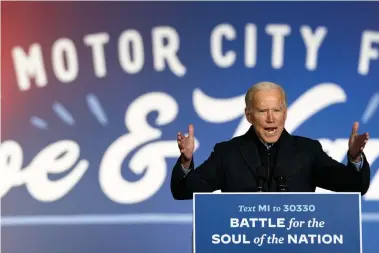  ?? DREW ANGERER GETTY IMAGES ?? Democratic presidenti­al nominee Joe Biden speaks during a campaign rally. A Donald Trump victory would result in a flounderin­g American economy that would drag down an already sluggish Canadian economic outlook, analysts say.