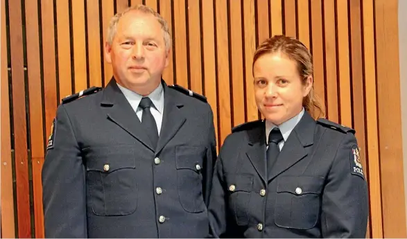  ?? ZIZI SPARKS/FAIRFAX NZ ?? Senior constable Gary Morgan and constable Haley Wells received District Commander Commendati­ons from the Waitemata Police.