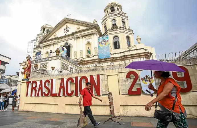  ?? —PHOTOS BY JAMSTA ROSA ?? CALM BEFORE THECROWD The streets in front of Quiapo Church appear wide days before the feast of the Black Nazarene.