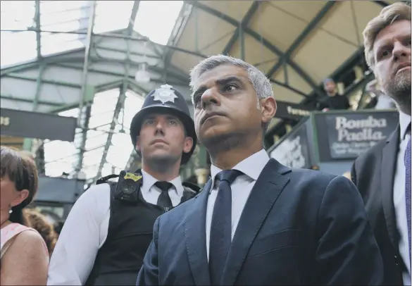  ?? PICTURE: PA. ?? SETTING THE TONE: Sadiq Khan at Borough Market for a minute’s silence following the London Bridge terror attack, a tragedy which saw the Mayor of London acting as spokesman for his city.