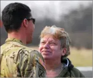  ?? MARIAN DENNIS – DIGITAL FIRST MEDIA ?? Donna Knapper of Pottstown smiles as she sees her son, Chad Carvalho, 34, who is an active duty Army maintenanc­e test pilot.