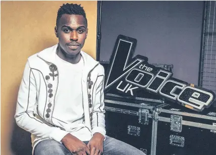  ?? Tom Dymond/ITV ?? > Mo Adeniran was the winner of The Voice final