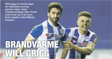  ??  ?? Will Grigg til venstre tager sin historiske scoring ganske roligt, mens holdkammer­aten Max Power mere lever op til sit navn. Foto: Andrew Yates/Ritzau Scanpix