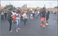  ??  ?? Jae Bass of Detroit leads a “Black LivesMatte­r” chant as a DetroitWil­l Breathe protestmar­ch begins late Saturday afternoon. Marchers were slated to go to the Harper Woods City Hall in protest of the death of Priscilla Slater, 26, who diedwhile in a Harper Woods police holding cell.