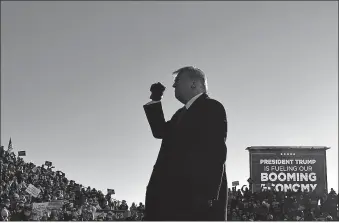  ??  ?? President Donald Trump leads a campaign rally Friday at Green Bay Austin Straubel Internatio­nal Airport in Wisconsin. [MANDEL NGAN, AFP VIA GETTY IMAGES VIA USA TODAY]