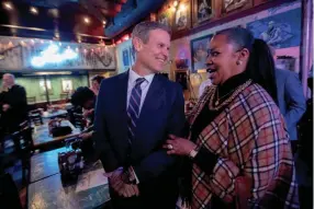  ?? MAX GERSH/THE COMMERCIAL APPEAL ?? Lucille Catron greets Gov. Bill Lee on Thursday at BB King’s Blues Club on Beale Street in downtown Memphis. Lee visited the club to announce the addition of the Beale Street Historic District and the former home of WDIA radio station to the U.S. Civil Rights Trail.