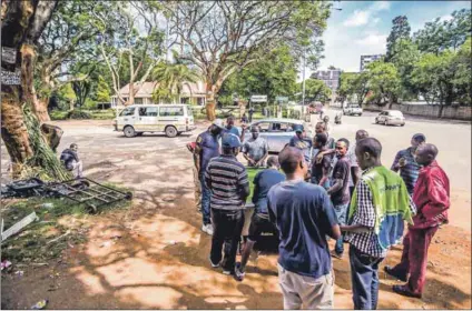 ??  ?? Branching out: The corner of Josiah Chinamano Avenue and Sam Nujoma Street in Harare has become the gathering point for taxi touts and other traders. The first jacaranda planted in Salisbury was on Cape Avenue, which became Montagu Street, which became Josiah Chinamano Avenue.