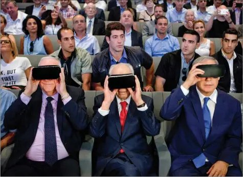  ?? REUTERS ?? Israel’s President Reuven Rivlin (L), former Israeli President Shimon Peres (C) and Israeli Prime Minister Benjamin Netanyahu wear virtual reality goggles during a ceremony at the Peres Center for Peace in Jaffa, Israel, on Thursday.