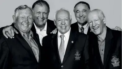  ??  ?? Smiles abound as Brad Park, Peter Mahovlich, Yvan Cournoyer, Frank Mahovlich and Jean Ratelle gather to relive glories past. Opposite: Frozen in time: Cournoyer (12) hugs Paul Henderson after the winning goal of the eight-game Summit Series against the...