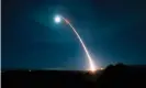  ??  ?? An unarmed US Minuteman III interconti­nental ballistic missile launches during a testing session in February. Photograph: Clayton Wear/US air force/AFP via Getty Images